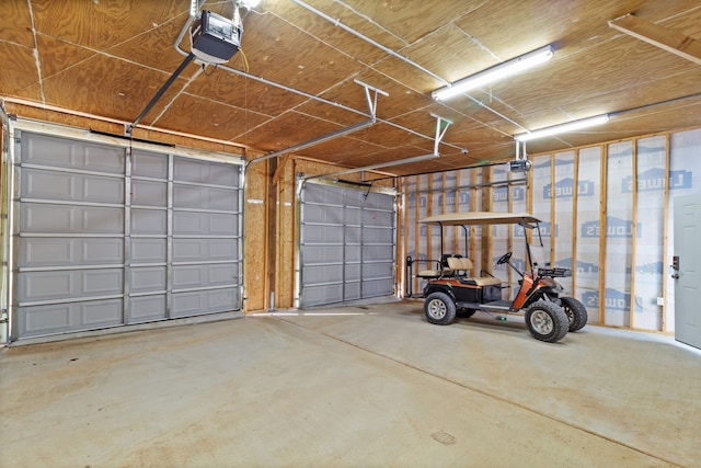 garage featuring a garage door opener