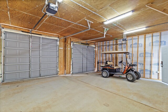 400 E Woodland Shores Dr, Point Blank, TX 77364 - garage with a garage door opener
