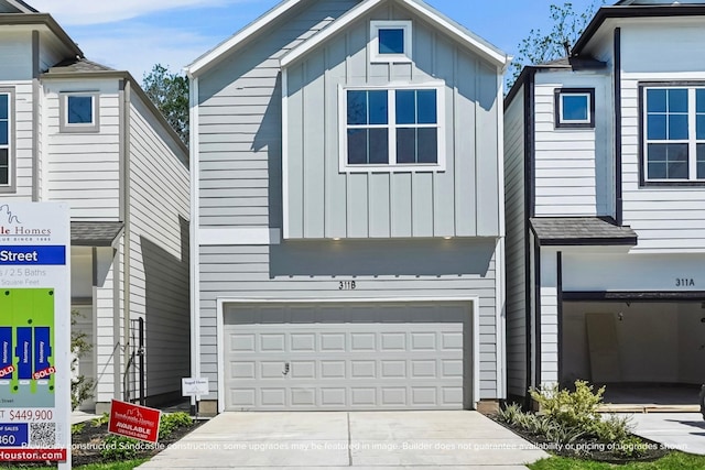 view of front of home with a garage