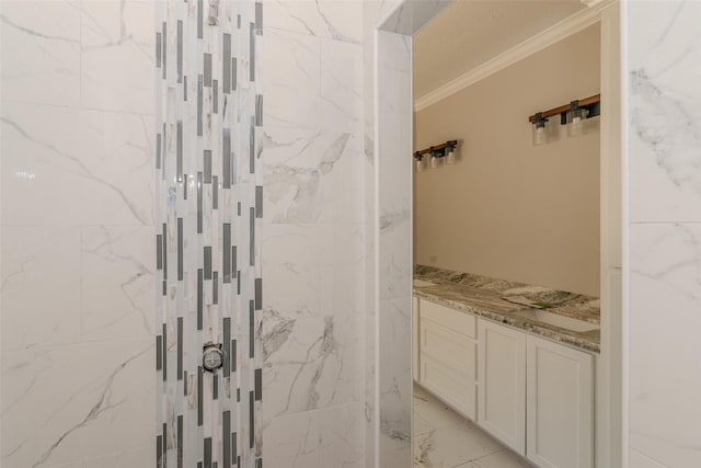 bathroom featuring an enclosed shower and ornamental molding