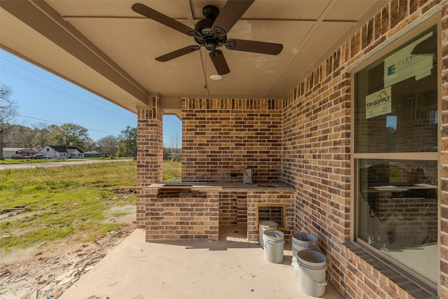 view of patio with ceiling fan