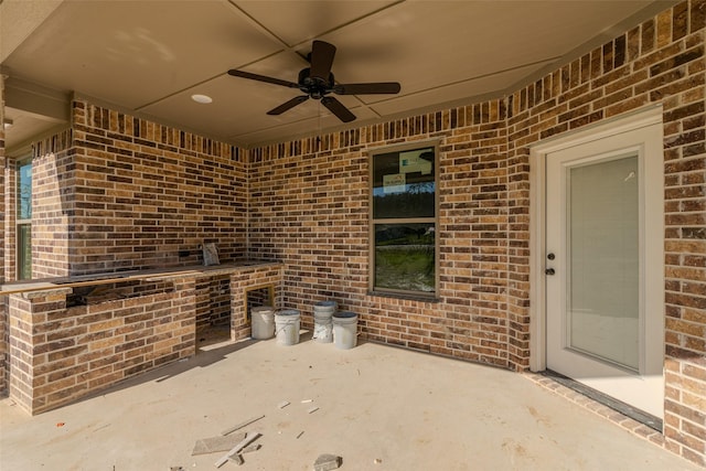 view of patio / terrace featuring ceiling fan