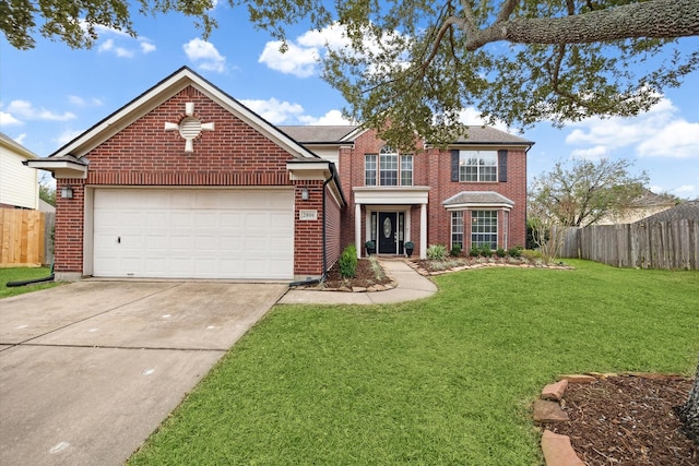 view of front property with a garage and a front lawn