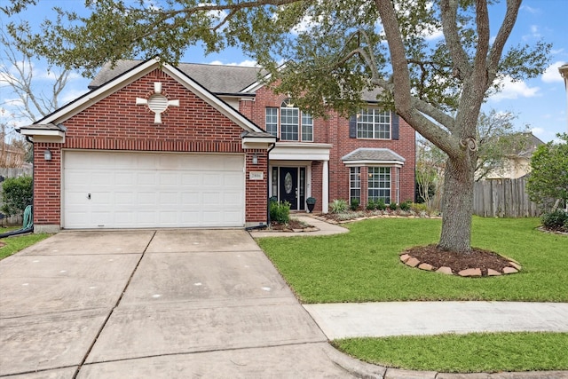 front facade featuring a garage and a front yard