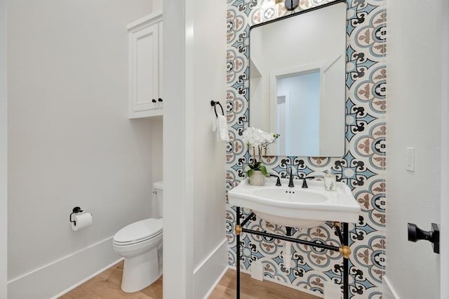 bathroom with toilet and sink