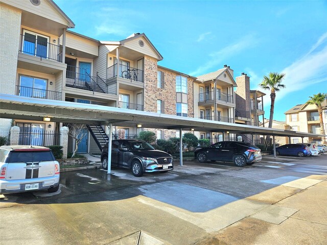 view of car parking with a carport