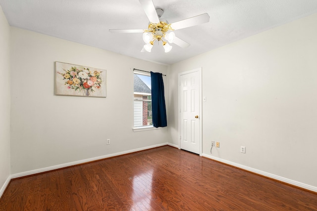 unfurnished room featuring ceiling fan and hardwood / wood-style floors