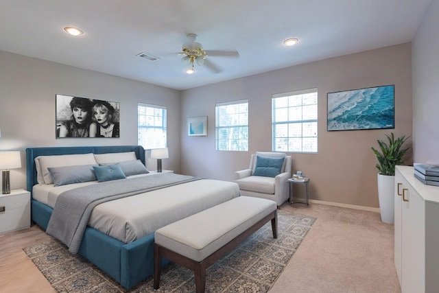 carpeted bedroom featuring ceiling fan