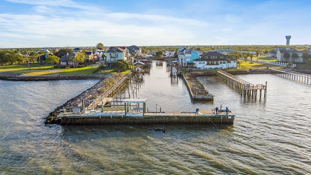dock area with a water view and a residential view