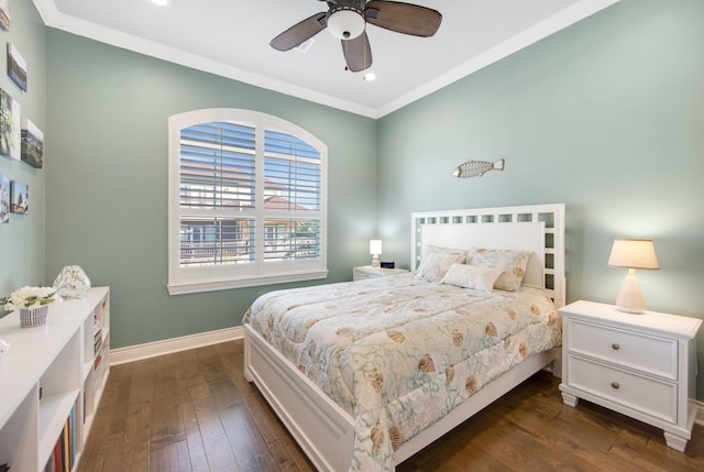 bedroom featuring ornamental molding, dark wood-type flooring, recessed lighting, ceiling fan, and baseboards