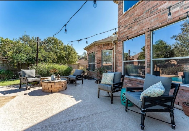 view of patio / terrace featuring a fire pit