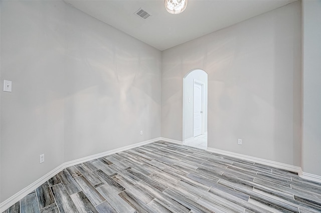 unfurnished room featuring light hardwood / wood-style floors