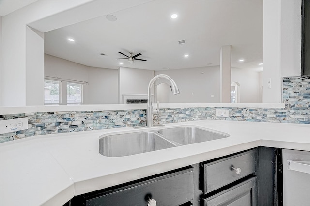 kitchen featuring sink, ceiling fan, and dishwasher