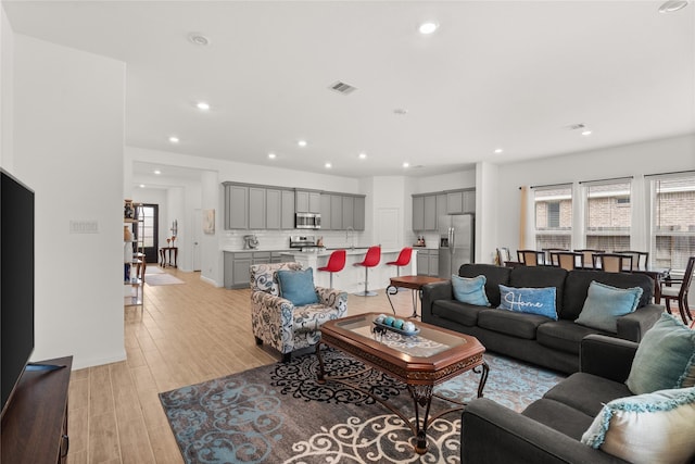 living room featuring light wood-type flooring