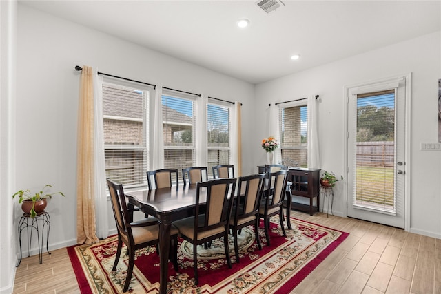 dining area featuring plenty of natural light