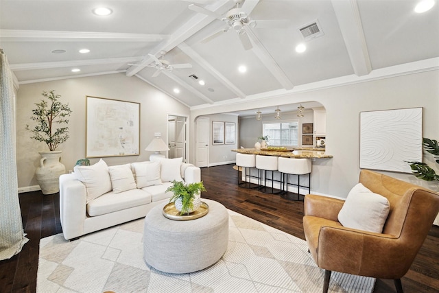 living room featuring vaulted ceiling with beams and hardwood / wood-style flooring