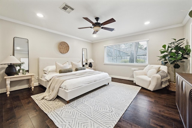 bedroom with ceiling fan, crown molding, and dark wood-type flooring