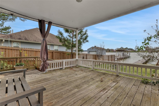 deck featuring a water view