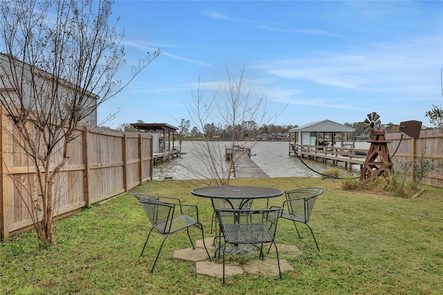 view of yard featuring a boat dock