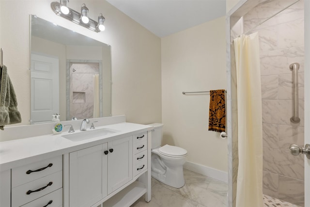 bathroom featuring toilet, vanity, and a shower with curtain