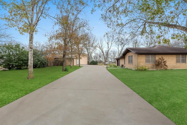 exterior space with a lawn