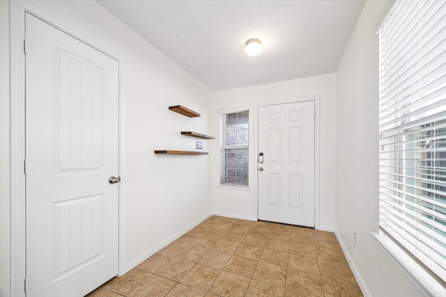 view of tiled entrance foyer