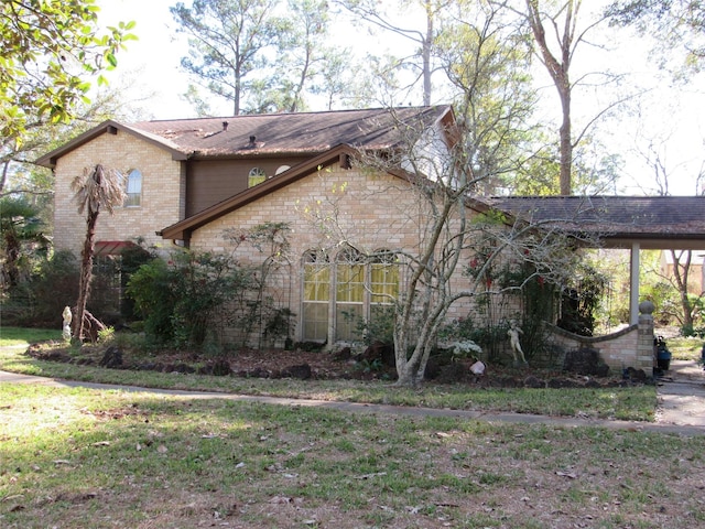 view of property exterior with a yard