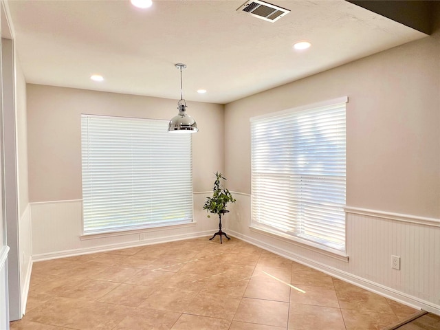 view of tiled spare room