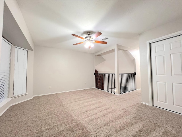 bonus room with ceiling fan, carpet, and lofted ceiling