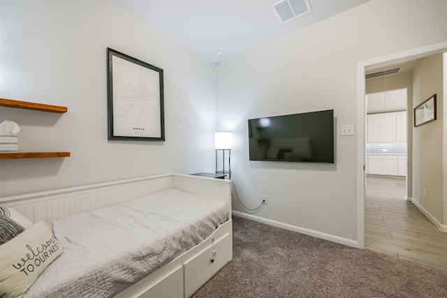 bedroom featuring carpet