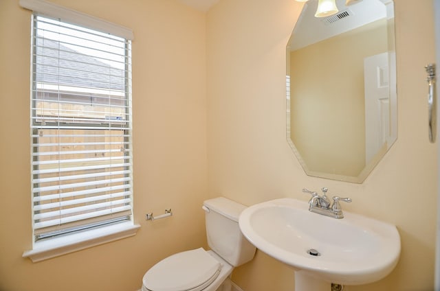 bathroom with toilet and sink