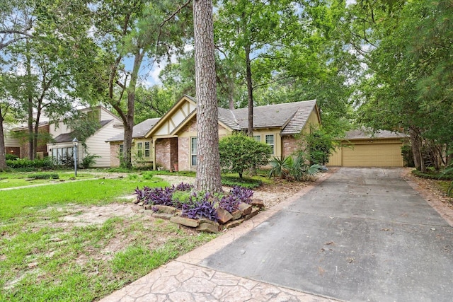 ranch-style home featuring a garage and a front yard