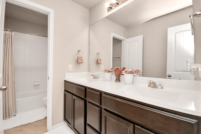 full bathroom featuring tile patterned floors, vanity, shower / bath combo, and toilet