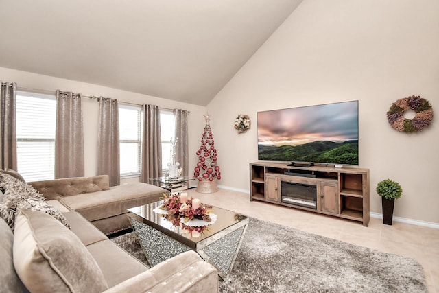 tiled living room featuring high vaulted ceiling