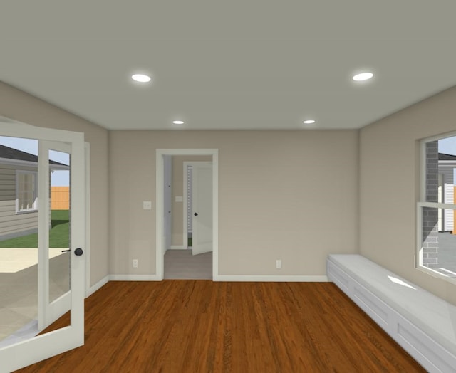 unfurnished room with hardwood / wood-style floors