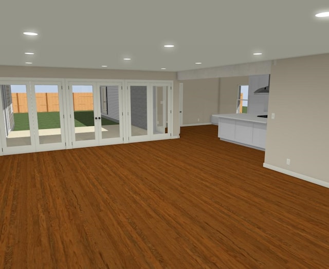 unfurnished living room featuring dark hardwood / wood-style flooring