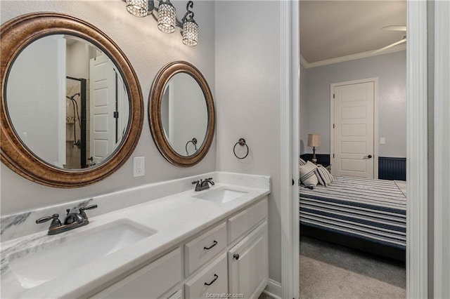 bathroom with vanity and ornamental molding