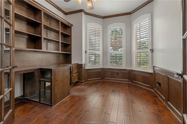 unfurnished office with crown molding and dark wood-type flooring