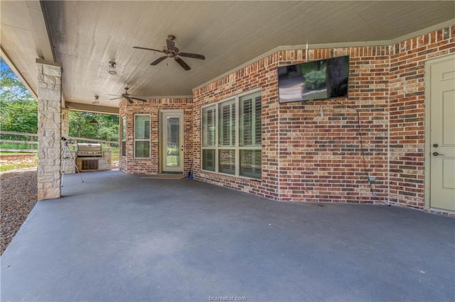 view of patio with ceiling fan