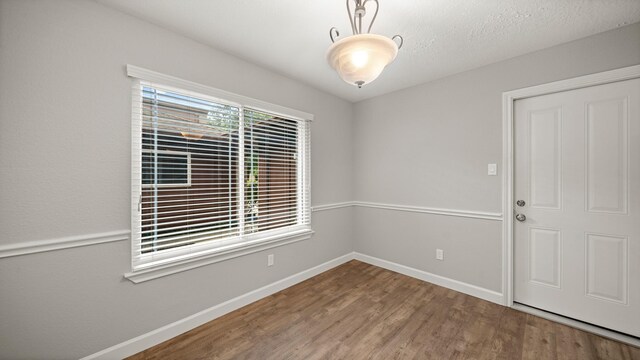 empty room featuring hardwood / wood-style floors