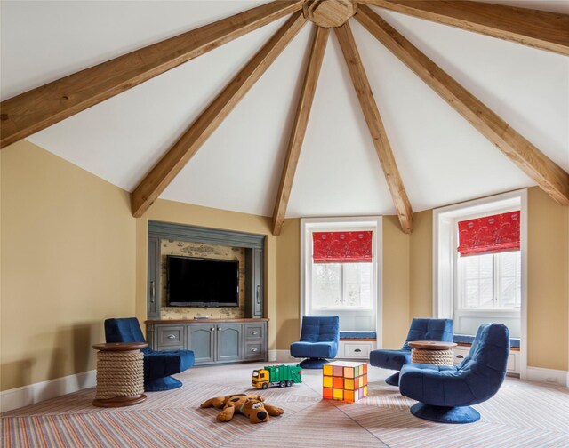 living room with a wealth of natural light and vaulted ceiling