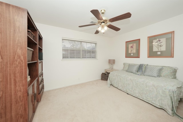 living room with light colored carpet and ceiling fan