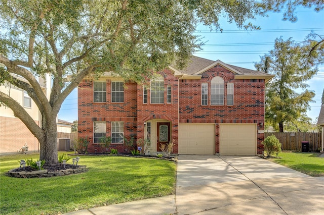 view of front of property with a front lawn, cooling unit, and a garage