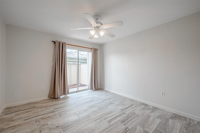 spare room featuring ceiling fan