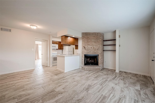 unfurnished living room with a fireplace