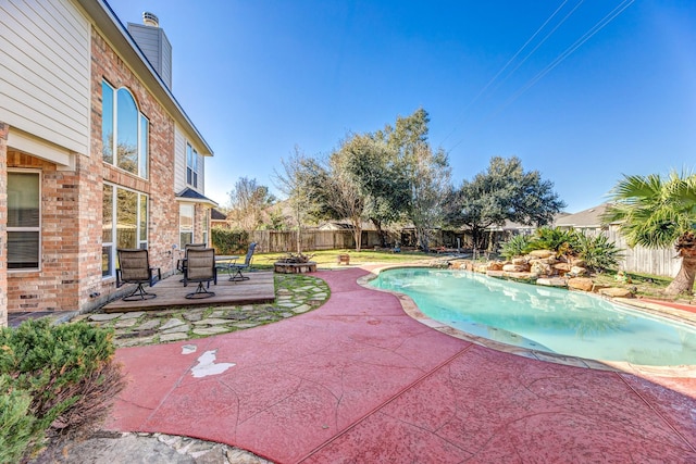 view of swimming pool with a patio area