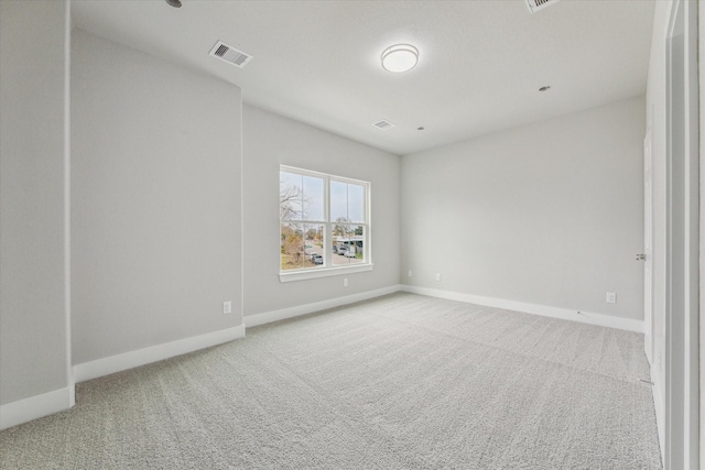 spare room featuring carpet flooring