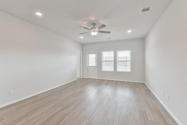 unfurnished room featuring light hardwood / wood-style floors and ceiling fan