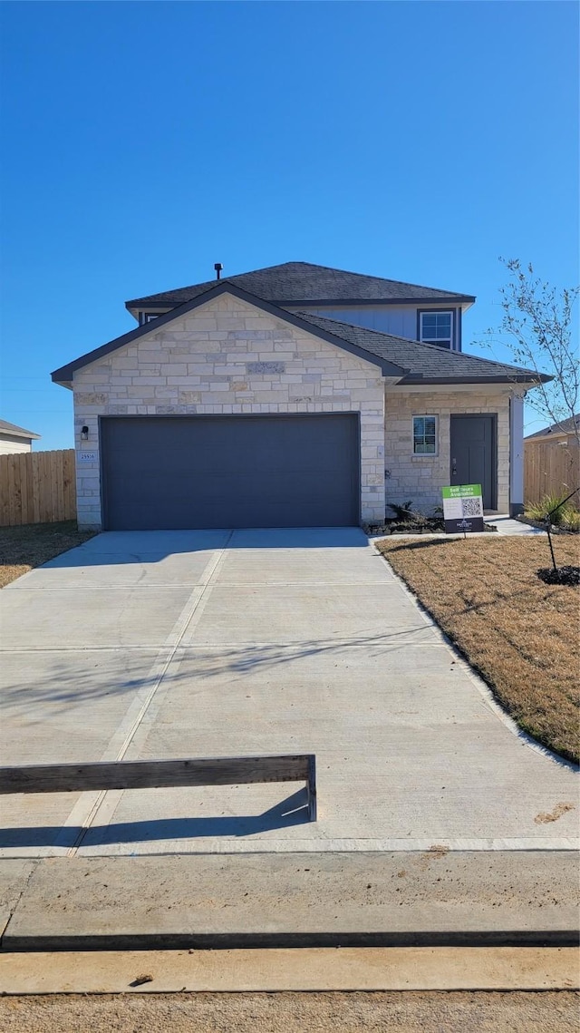 view of front of home featuring a garage