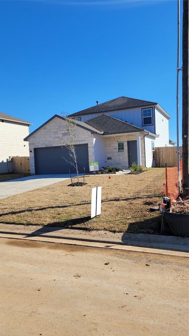 view of front of home with a garage